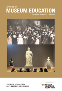 The cover of the Journal of Museum Education 49.2, featuring two photos. Top photo is an old vintage photo of people in the 1900s looking at bones of a large animal in a museum. The photo below is a modern photo of a young woman standing next to a statue in front of seated children.